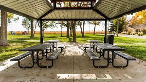 Perforated Picnic Tables Are A Popular Choice Among Parks Update Your Picnic Pavilion With New Amenities To Keep Your Outdoor Structures Picnic Table Pergola