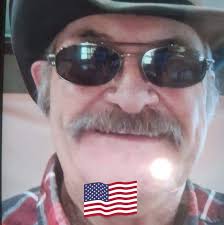 What is the average cost of drive-in movie theaters that charge by the car?