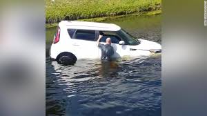rescue a woman from her sinking car cnn