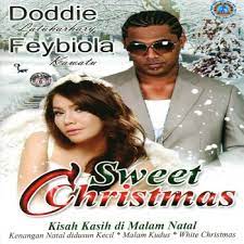Yuk, simak kumpulan lagu natal dari penyanyi dalam negeri di sini! Kisah Kasih Di Malam Natal Testo Doddie Latuharhary Feat Feybiola Kawatu Mtv Testi E Canzoni