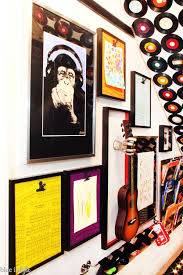 A Music Themed Playroom Under The Stairs Displaying Kids Artwork Under Stairs Playroom Under Stairs