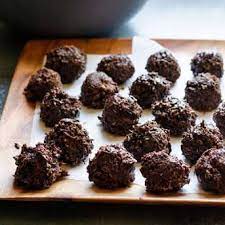 Healthy Chocolate Coconut Balls Recipe Yummly Recipe Cacao Recipes Coconut Balls Healthy Chocolate