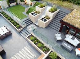 From defining specific spaces to ensuring your privacy, our garden wall bricks will effortlessly complement our selection of driveway and garden paving. Symphony Vitrified Plank Garden Paving Marshalls Luxury Garden Backyard Landscaping Designs Back Garden Design
