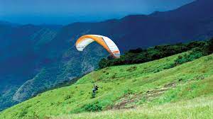 Kerala taxi booking , kerala real estate, malayalam cinema. Vagamon Hills Paragliding Destination Idukki Shooting Location Kerala Tourism