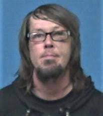 Cuyahoga Falls man accused of coughing at police, EMS facing felony