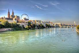 A city with historical buildings next to modern architecture. 3 Amazing Ways To Explore Beautiful Basel Radisson Blu