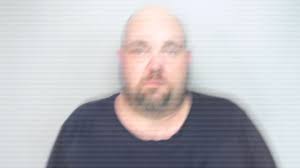 7 hour SWAT standoff leads to former school bus driver's arrest