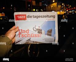 Paris, France - Jan 21, 2021: POV man buying Taz die tageszeitung German  newspaper headline words Und Tschuss translated as good bye featuring  Donald and Melania Trump leaving the presidency Stock Photo - Alamy