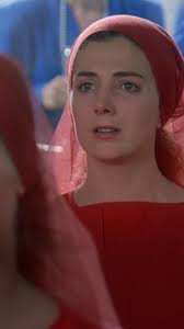 Before the TV phenomenon, there was the original 'The Handmaid's Tale'  movie., Here, Ofwarren/Janine (Traci Lind) gives birth in front of the  Handmaiden's and Officer's wives., The Handmaid's Tale