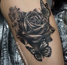 This black rose is shaded heavily in black and grey. Butterfly On Rose Tattoo Arm Tattoo Sites