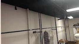 Stairs to props and costume storage in a theater.