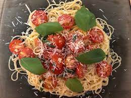 While the pasta is cooking, warm the olive oil in a small skillet over medium heat. Ina Garten S Summer Pasta Dish With Tomatoes Is Easy To Make