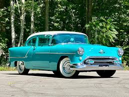 Image result for Dagestan Blue 1928 Oldsmobile