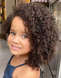 Braided hairstyle for curly hair. Awesome Haircuts For Kids With Curly Hair For 2020 Stylezco
