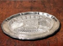 As your guests pick up homemade treats off your newly polished vintage serving tray, you can smile knowing you didn't spend a fortune (and you're not scratching mama's silver either). Lot Art Oval Silver Plate Divided Serving Tray Silverplate Crystal