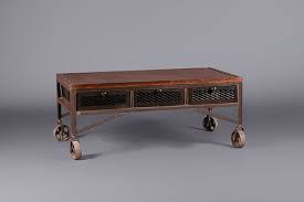 A coffee table on wheels comes with a world of advantages, and it definitely is a lot more exciting than those traditional, stationary ones that seem to go nowhere in terms of style and personality! Industrial Aged Coffee Table On Wheels