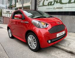 Image result for Amethyst Red 2012 Aston Martin