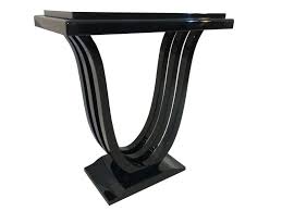 The range features sleek, streamlined table tops in black high gloss finish, with sturdy u shaped legs in a beautiful polished gold finish. High Gloss Black Art Deco Style Console Table Original Antique Furniture
