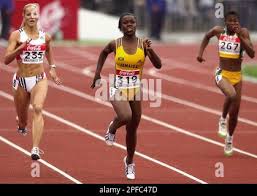 Jamaica's Veronica Campbell, center, competes with Germany's Sina Schielke,  left, and Ghana's Vida Anim in the women's 200-meter final at the World  Junior Championship in Athletics, in Santiago,Chile, Saturday, Oct. 21,  2000. Campbell won her second ...