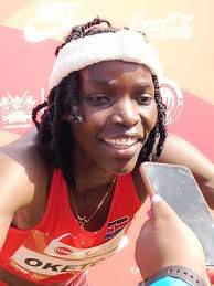 Kristina Marie Knott @knottyourcheese is a Filipino American track and  field athlete. During the 2018 Asian Games Kristina Knott promised she  would break the women's 200 meter world record held since 1986. “