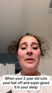 Toddler Cuts Mom's Hair While She Sleeps