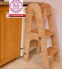 The kitchen helper tower, also known as the learning tower, allows your toddler to reach the kitchen work surface or the sink and get involved in various activities, such as washing up, baking, fruit and veg preparation, teeth brushing, checking the world out through the window, and many more exciting. Kitchen Tower Plan Toddler Tower Desk Combo Plan Montessori Etsy In 2021 Learning Tower Diy Learning Tower Kitchen Helper
