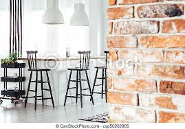 Image #7 from 41, living dining room brick wall design house. Dining Room With Brick Wall Red Brick Wall In Rustic Dining Room With White Lamps Above Countertop With Black Bar Stools Canstock