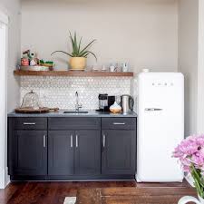 Example sentences from the web for kitchenette. Office Kitchenette Smeg Black Cabinetry Open Shelving Custom Shelving Kitchenette The Bellepoint Small Kitchenette Apartment Kitchen Basement Kitchenette