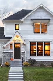 Trim helps cover the edge between the side and the window frame, which helps maintain the windows are lined with a straight, clean, white trim that matches the other clean lines for the rest of the house. 53 White House Black Window Exterior Ideas Sebring Design Build