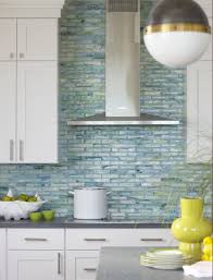 Coastal Beach House Kitchen With Watery Blue Green Glass Tile And Pietra Cardosa Beach House Kitchens Beach Kitchens Coastal Kitchen