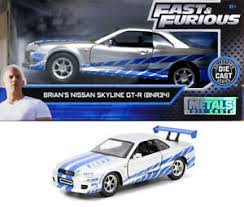 66 ford mustang fastback across dom's house (brian pointing a gun at dom scene) it was a bit rusty park inside a gate. 2002 Nissan Skyline Gt R R34 Brian Fast Furious Silver 1 32 Jada Toys 97184 Ebay
