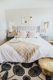 The bedding is decorated with catchy red linens and throw pillows. Easy Farmhouse Master Bedroom Ideas Our Modern Neutral Bedroom