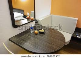 The high seatbacks are carved with a simple design, while the. Corner Table Images Search Images On Everypixel