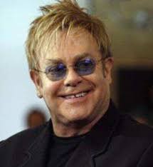 Elton John demands protection of transgender prisoners