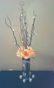 Flowers And Lighted Branches Weddingbee Photo Gallery Branch Centerpieces Wedding Flower Centerpieces Flower Centerpieces Wedding