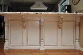 Cabinets, countertops, the range hood, possibly open shelving, and more. Osborne Wood Products Blog Reeded Island Posts And Acanthus Leaf Corbels