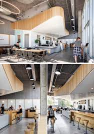 The Main Focal Point Of This Modern Coffee Shop Cocktail Bar Is The Sculptural White Volu Houndstooth Coffee Modern Coffee Shop Interior Architecture Design