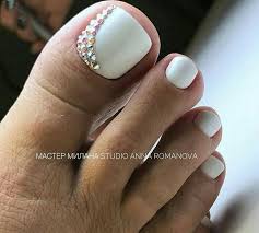Match your hands and toes with this adorable looking violet explosion. White Toenails Pretty Toe Nails Toe Nails Pedicure Nail Art