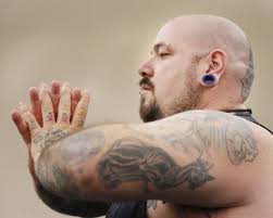 HORLYK: Wayne, Neb., native not your typical yoga instructor