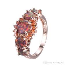 3.24 carat oval cut opal diamond 18 karat yellow gold ring the oval cut opal in this ring weighs 2.67 carats and the measurements of the opal are 8 mm x 12 mm. 2021 Gorgeous Men Women Orange Green Fire Opal Ring Fashion Rose Gold Filled Jewelry Vintage Wedding Band Dropshipping Gifts From Xincheng2017 4 71 Dhgate Com