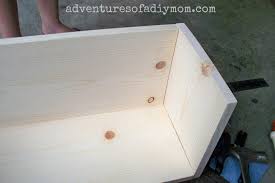 Attach cleats around the bottom of the box with the pneumatic nailer. How To Build A Toy Box Adventures Of A Diy Mom