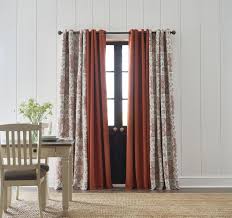 It is the one with rod installed very close to the ceiling. The Do S And Don Ts Of Choosing Window Treatments