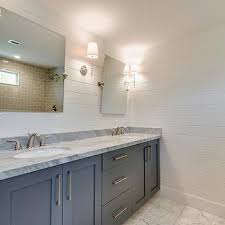 Grey cabinets with white countertop bathrooms with shiplap and subway. Interior Design Inspiration Photos By White Gold Design