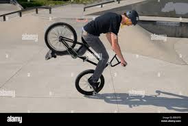 Flatland Bmx Bike Rider Doing A Nose Manual Dork Wheelie Trick On Front Wheel Toronto Canada Stock Photo Alamy
