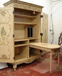 I Want To Add A Pull Out Table Like That To My Armoire Doesn T Look Too Hard Sewing Room Storage Sewing Cabinet Sewing Room Design