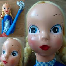 Lovely doll...hard body..approx 12-13 inches.