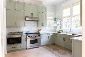 Farmington white maple shaker cabinets,dovetail drawers with soft close slides. Stacked Gray Green Cottage Kitchen Cabinets Cottage Kitchen