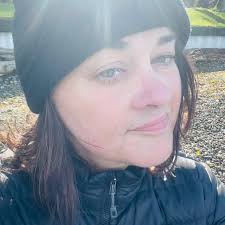 Handing me to-go coffee