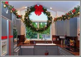 But while you may be completed focused on sprucing up your entryway, living room, and even your dining space for your big celebration, there's one area you might overlook: The Heart Of The Holiday Decorating Your Kitchen For Christmas Christmas Kitchen Decor Christmas Kitchen Christmas Decor Diy