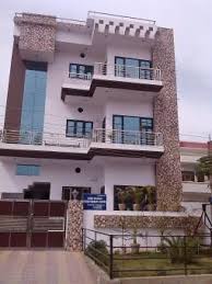 A Beautiful Front House Elevation Design With Tile Cladding Front Elevation Designs House Front Design Bedroom Interior Design Modern